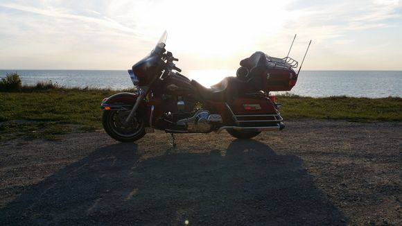 Stopped near the lake on an  evening ride. 
Scott