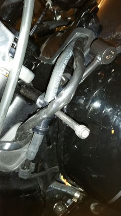 slide bolt through arms and mounting slot on bike (with help of random woman from the house)