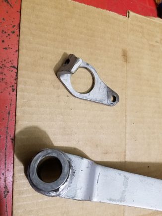 Assembly with cam/bell crank cut off