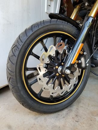 13 spoke mags from an early 2000's FXD. Chopper Hauss 14" 13 spoke rotor and break caliper relocation bracket  B