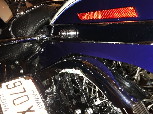 My initial problem was my fender was hitting the belt guard when the air suspension was let all the way down.  This was what the guy that customized my swing arm said was the reason the rear of the frame sat 3/4” off the ground. He claimed he adjust the shock to not hit the guard. 