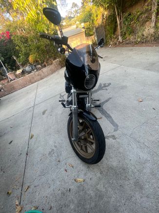 2017 dyna low rider rims fat cat exhaust 2009 street bob headlight and light bar ,rims front brake installed by Dave mackie engineering
