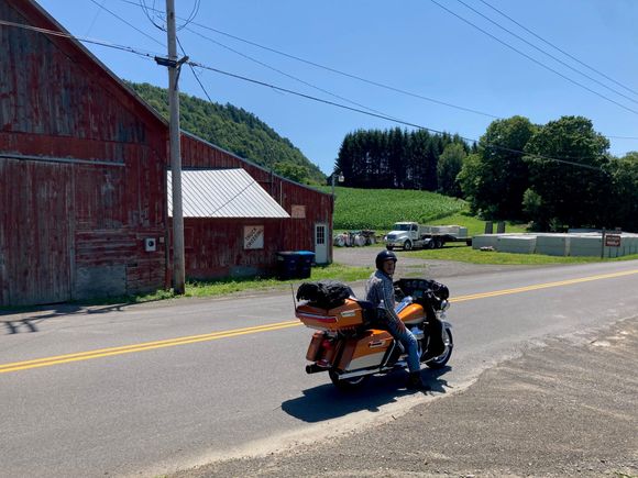 This pic was taken in summer of 2023, in front of my Uncle's former business making concrete forms.  His house is up on the hill in the background, that's where first pic was taken 40 years prior.