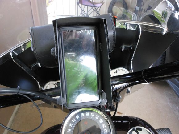 Drivers view installed.  I used the Velcro so when I don't mount the phone, I can undo the Velcro and fold the shied flat to store in the saddlebag so it is with me. If the sun is behind you it may not work, but it should help to be able to read the screen most of the time.  It is possible you may want to increase the sides and top  to 3" or more, but I did not want it to stick out too far.