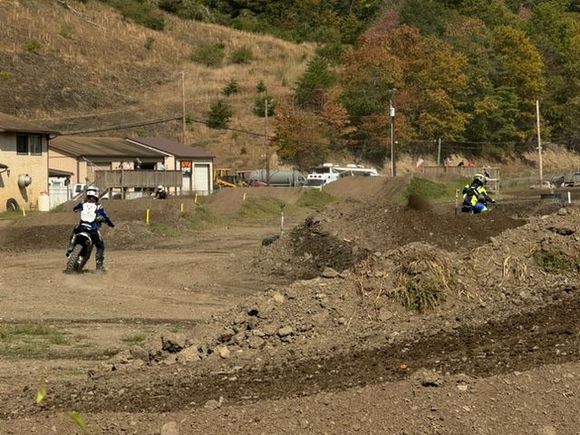 A Motorcycle Dirt track next to the Zimmerman Covered Bridge.  There are two tracks there and must have had races or time trials going on