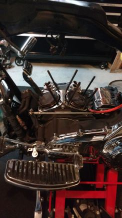 Heads and jugs off.  Nasty tops for only 20K on the engine.  popped off the c-clips and pushed out the wrist pins. 