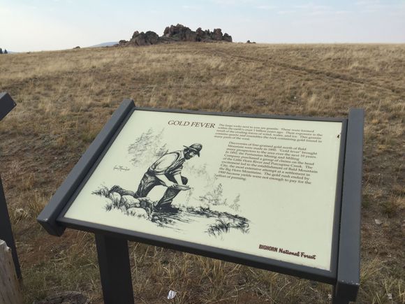 A bit further on. Billion year old outcropping. There is a big Medicine Wheel up a gravel road right here, but it was getting late and I will come back again for the ride up.