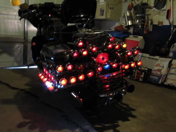 over 40 lights on the back. most are vintage bullets with glass lenses. 