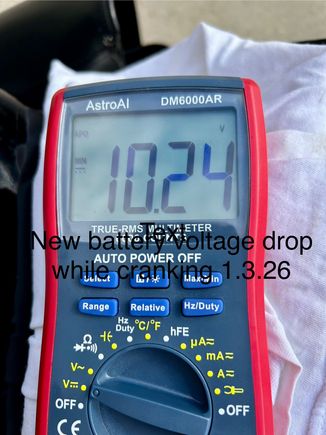 Voltage drop while cranking new battery