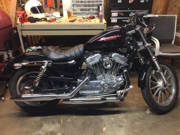 Here's where I'm at now. Put a stock Iron seat from a '14 on. I prefer the look and feel, just not 100% sure it fits with my bike. With the weather changing I doubt I'll get out to try it on longer rides until spring, but I can wait. Next step is to get the wheels off and my new Metzler tires installed at a shop by my house.
