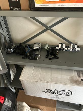 Removed exhaust and front fender. Showing my front wheel some love with the protective blanket my SO offered up for the cause. Removed coil/bracket/top engine motor mount and VR. 