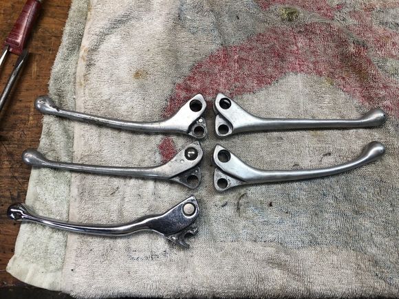 Side A
Chromed broken lever that was on the bike on the bottom left