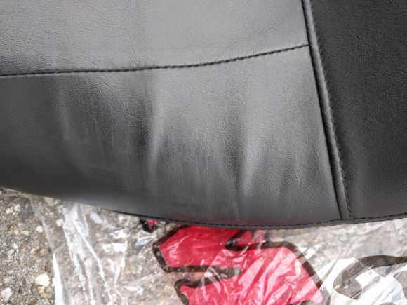 Scuff on left side from previous owner.  I don't know how they did it in only 1,300 miles.  Otherwise it's in like new shape.