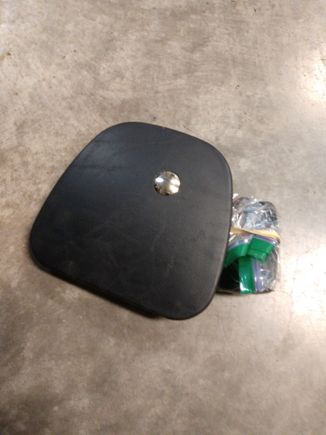 A waterproof momentary switch paired to a Chamberlain universal remote on the right lower cover  is how I do it. I put the remote in a Zippy bag and Velcro on the back.
