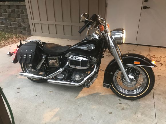 These are pix of my 84 FLHS, it has just under 5K miles. I took the seat off so it didn't get damaged and put the rack and throwers on it. I think Ill ride it on an AMCA road run this year. 