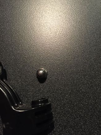 You will need to remove the nut from the bar clamp. This is also where the longer bolt will go. 