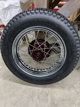 rims and wheels done with rear hub painted and new spokes 