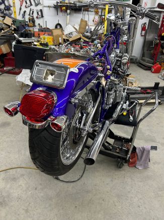 Put lights  and turn signal bar on but the day starting as I forgot to run the wires so take off the fender and run the wires thru the inside tubing in the fender !