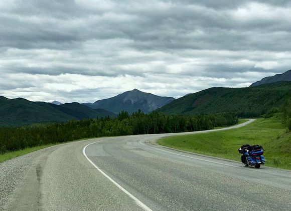Approaching the Northern Canadian Rocky Mountains, just north of Muncho Lake… It’s a hell of a ride, and worth every bit of inconvenience you’ll go through to do it… 