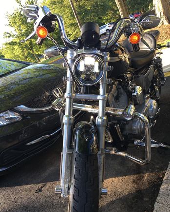 Wisamic LED light installed, chrome eyebrow cover removed.