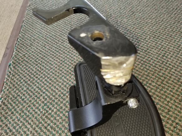 Left support ground away to clear transmission housing