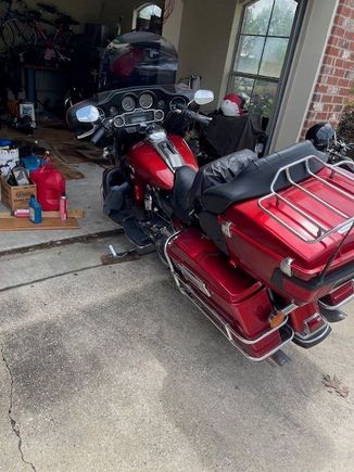 Last time some folks mentioned the dangers of the 2x4 under the tire and jiffy stand.  Pic is to highlight that yet again I have enough room for the drain pan.  System works without drama and its quicker than pulling out the cycle jack