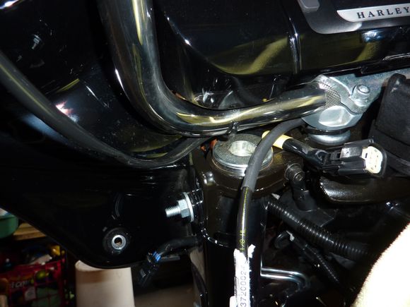 Cut the three zip ties that hold the switch wiring to the handlebars.