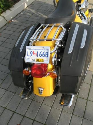 V&amp;H oval port nice sound not too loud just right tone. billet alum. lic. plate. added upper trim package to leather cases.  detachable rear solo rack and additional detachable hardwarefor quick removal hard case trunk