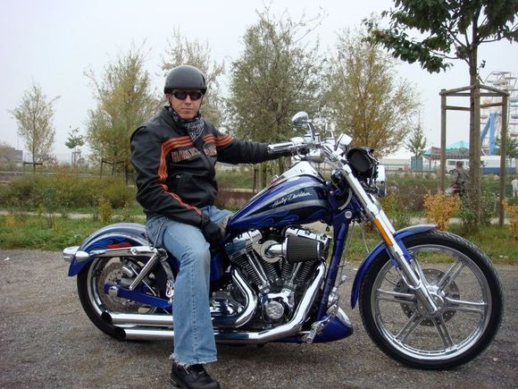 I replaced the rear shocks with 9.5" billet struts effectively lowering the bike 2" and slamming the rear wheel into the fender.  The pipes are being replaced to make right turns a little less noisy!  Next pict will show the new pipes when installed.  I love this bike!