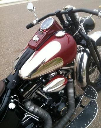 Right side. scallops!  Done in Jaguar Auto Burgandy with gold pinstripe.  Also, you can see the starter and horn buttons that I relocted to the dash.  No wiring in the bars.  The high/low beam in also on the fron left of the dash (toggle switch not visable from this view).