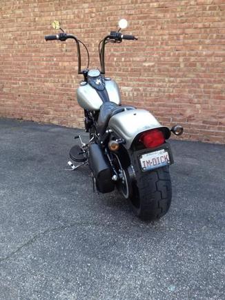 5/1/13 - With Metzeler 140/70-21 mounted on Black Bike 21x3.5, Burly 1.5" lowering kit, Vulcan 7.5* rake kit, Nash 14" Gimps and blacked out motor.