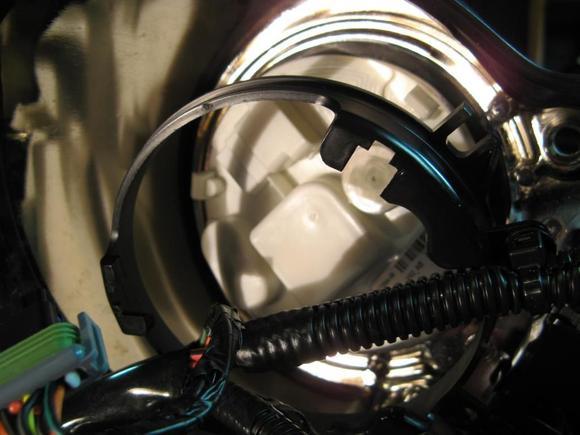 Remove bracket, then pull Speedo out of dash from other side.