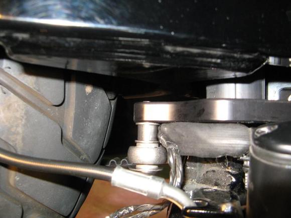 Stabilizer link installed onto rear TT bracket; wire bundle is a tight fit but could not be moved anywhere else. Need to inspect periodically for any fraying/rubbing. Note rear brake line in front of pic.