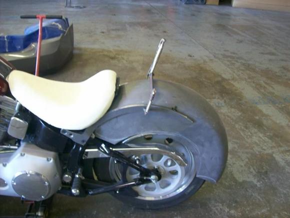 mock up of rear fender and original seat cut and shaped for new rear fender