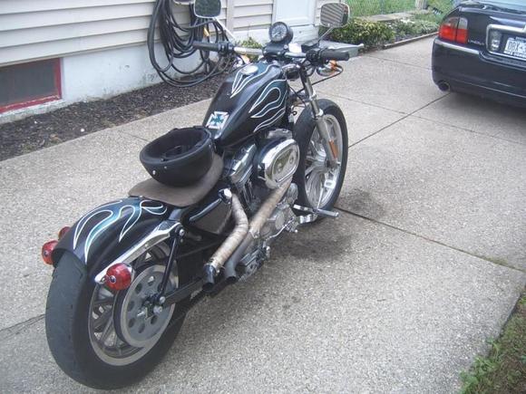 This is the Right rear of my sporty when I got it, on this side i put the chrome oil tank cover on, and am waiting to put the black exhaust wrap on.Still waiting on Wide whitewall tires already ordered