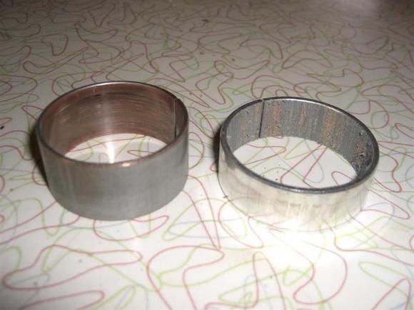 Right side fork bushings from my Wide Glide...2 seasons old.