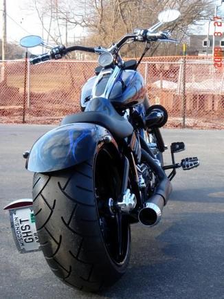 REAR VIEW
HHI Side-Mount Plate w/ Drive-Side Brake
Airea5150 Paint w/ Powdercoated Pieces
2-1 Short Megaphone Bassani Exhaust
Renegade Wheel w/ Metzler Tire