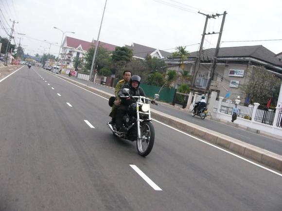 Vientian Laos Police Man on my rear seat.... Dec 2007