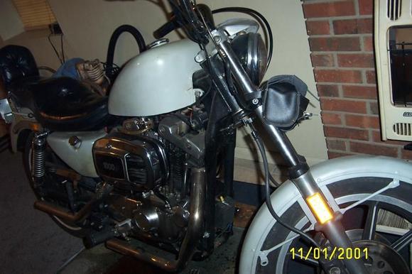 #1 031 it now has a set of dyna handle bars.i really need some good info on turn signals as i need the the whole system. i have the wiring out of handl bars it checked out good. i have no idea the fac. book i have dosnt show or explain in my wiring diag. exatly how it wires at the relay.it shows a 3thrd.wire same color (green) going nowhere.anybody have a solution or any other suggestions