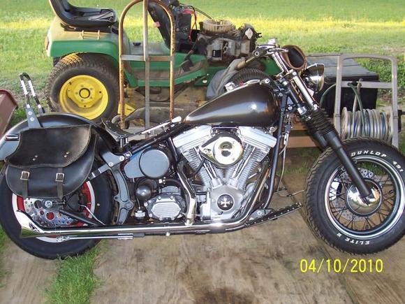 '87 FLST, affectionately known as my Sloptail.  New crate motor, S and S E, Dyna S ignition.  Handmade drag bars, internal throttle, and a buncha other off-the-wall -not-off-the-shelf goodies.