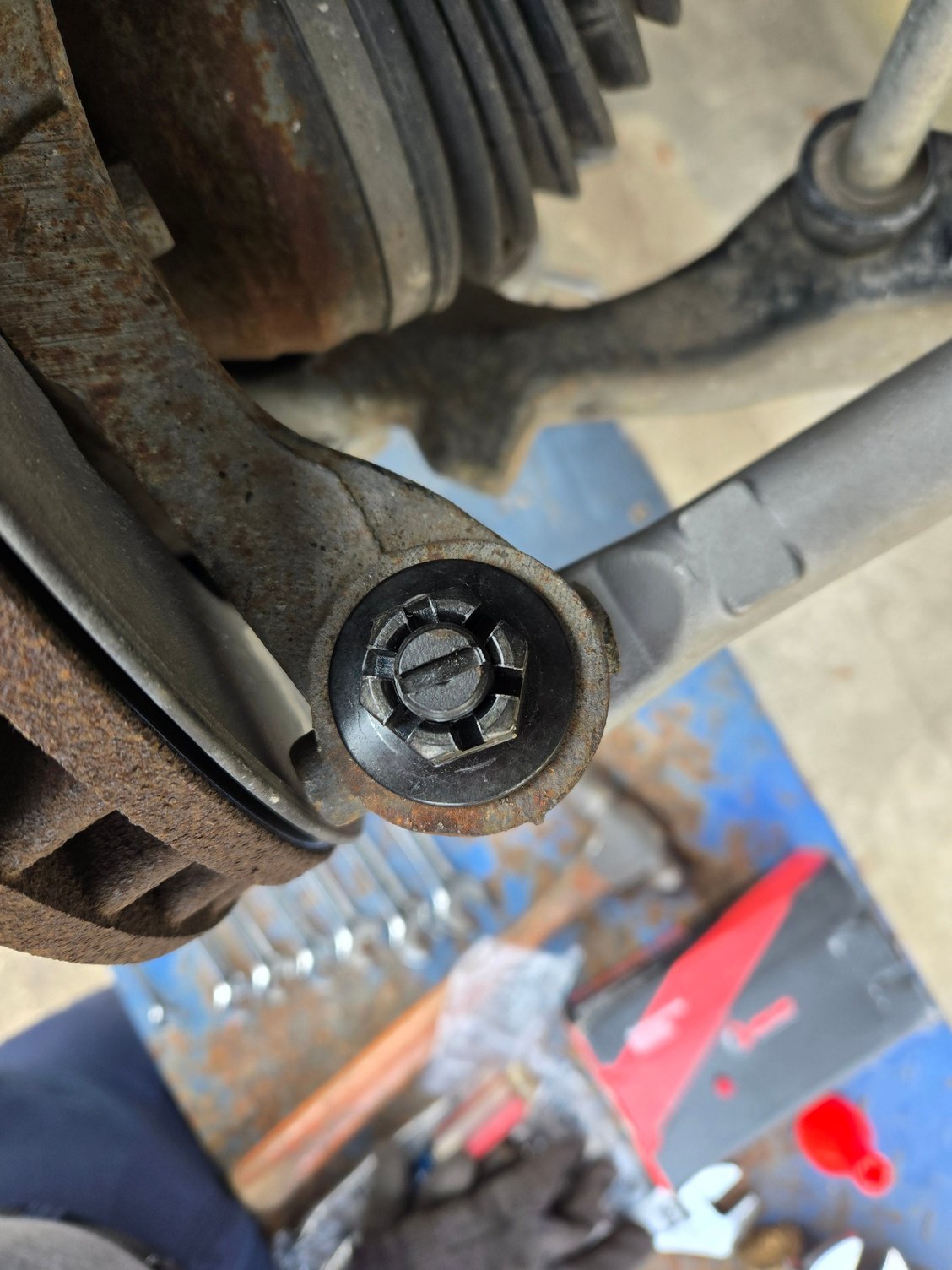 RD has a clot ground in the end for holding it in place when removing it. I is 90 degrees from the cotter pin hole which gives you a reference when tightening the nut