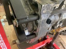 Before removing the oil pan, ensure that the engine mount is NOT attached to any of the threads that are attached to the oil pan.  Otherwise, when you remove the oil pan, bad things will happen.  