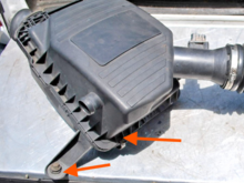 Coolant collecting in the well where you bolt the box to the engine bay as well as right above the front retainer clip closest to the radiator.