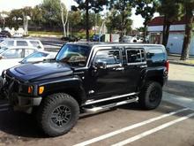 OEM Powdercoated rims, 33' Mickey Thompson BAJA tires, rhino sprayed grill, brush guard   4 fog lights
