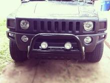 added bull bar and rubber coated off road lights   texture painted black grill