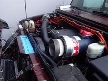 Viewing close up of hybrid motor at SEMA 2015 in Las Vegas