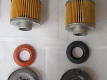 UPF48R uses silicone backflow valve and different spring. Black can vs. blue.  