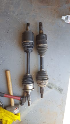 The Axle on the left is the Cardone.  The one on the right is the original.