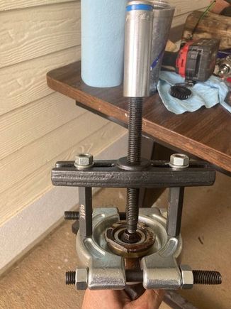 Bearing puller to remove the broken piece.  