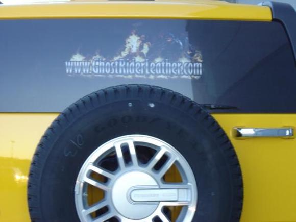The back of my 2006 Hummer H3. This back window graphic turned out WAY smaller than what I thought it was going to be, wasn't happy. About to get it re-done. This was when my baby was still new!